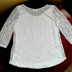 Ladies Laced Peck & Peck White lined  top. 100% Polyster.